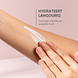 Louis Widmer Lichaamsmelk Licht Geparfumeerd 200ML handmodel met toefje crème