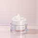 Louis Widmer Hydraderm Nachtemulsie Licht Geparfumeerd 50ML Lichtroze achtergrond met product