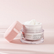 Louis Widmer Nutriderm Dagcrème UV 20 Zonder Parfum 50ML Lichtroze achtergrond met product Louis Widmer Nutriderm Dagcrème UV 20 Zonder Parfum 50ML Lichtroze achtergrond met product