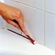 HG Siliconenkitverwijderaar 100ML sfeerbeeld kit verwijderen badkamer kitvoeg
